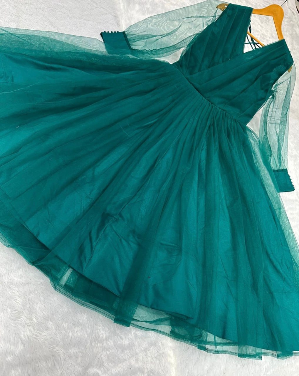 Green net heavy flair plain party wear gown