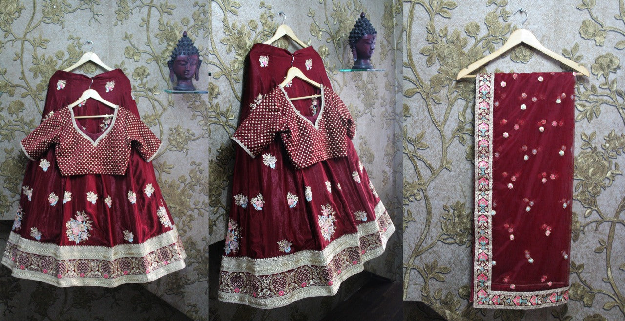 Deep maroon royal wedding lehenga with gold embroidery