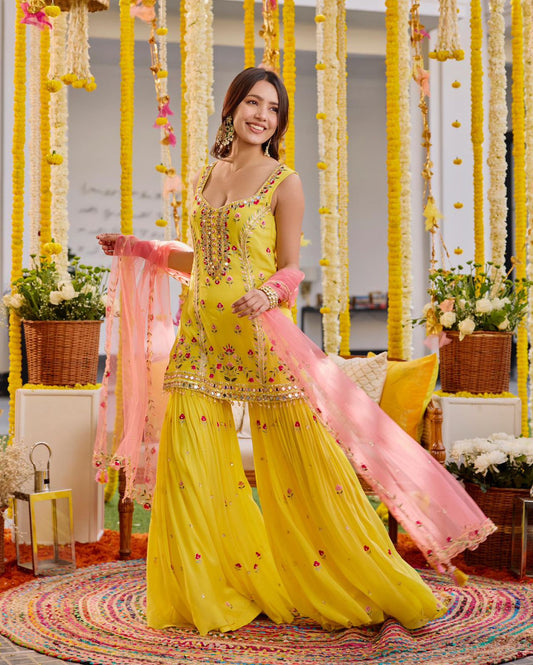 Yellow georgette embroidered sharara suit for haldi ceremony