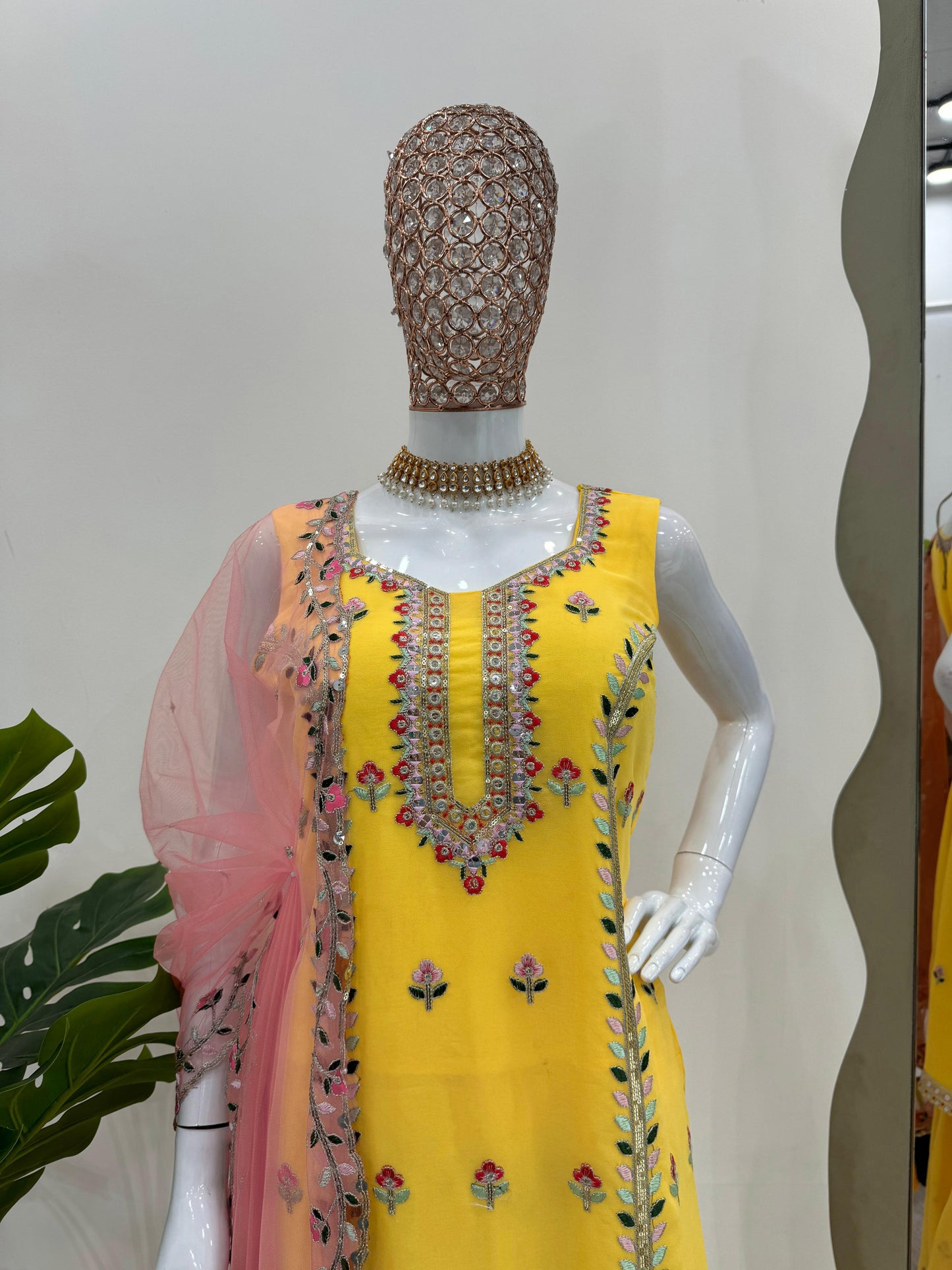 Yellow georgette embroidered sharara suit for haldi ceremony