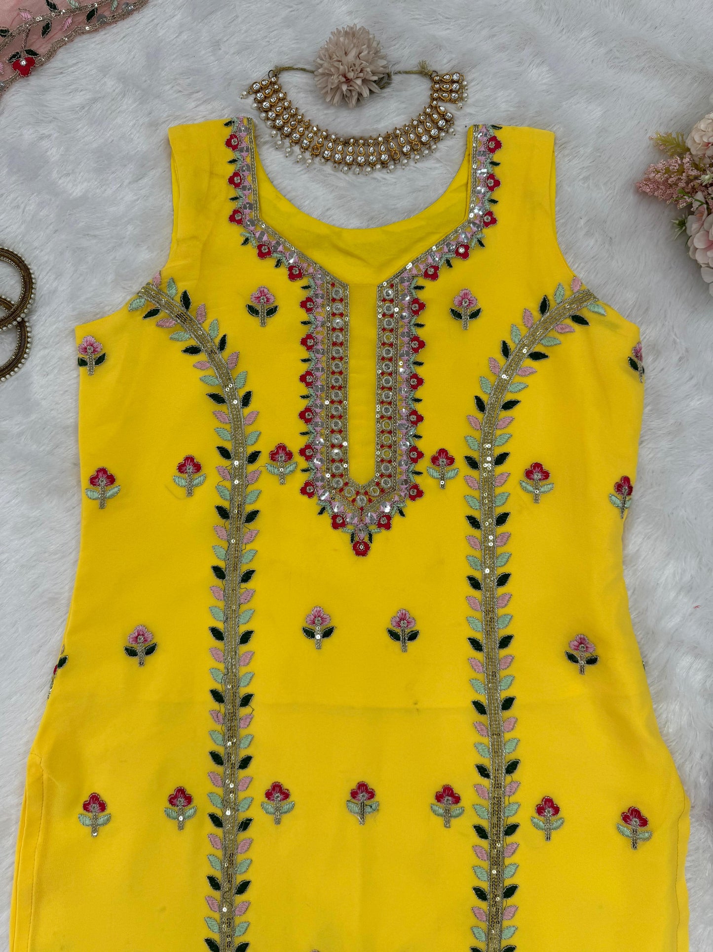 Yellow georgette embroidered sharara suit for haldi ceremony