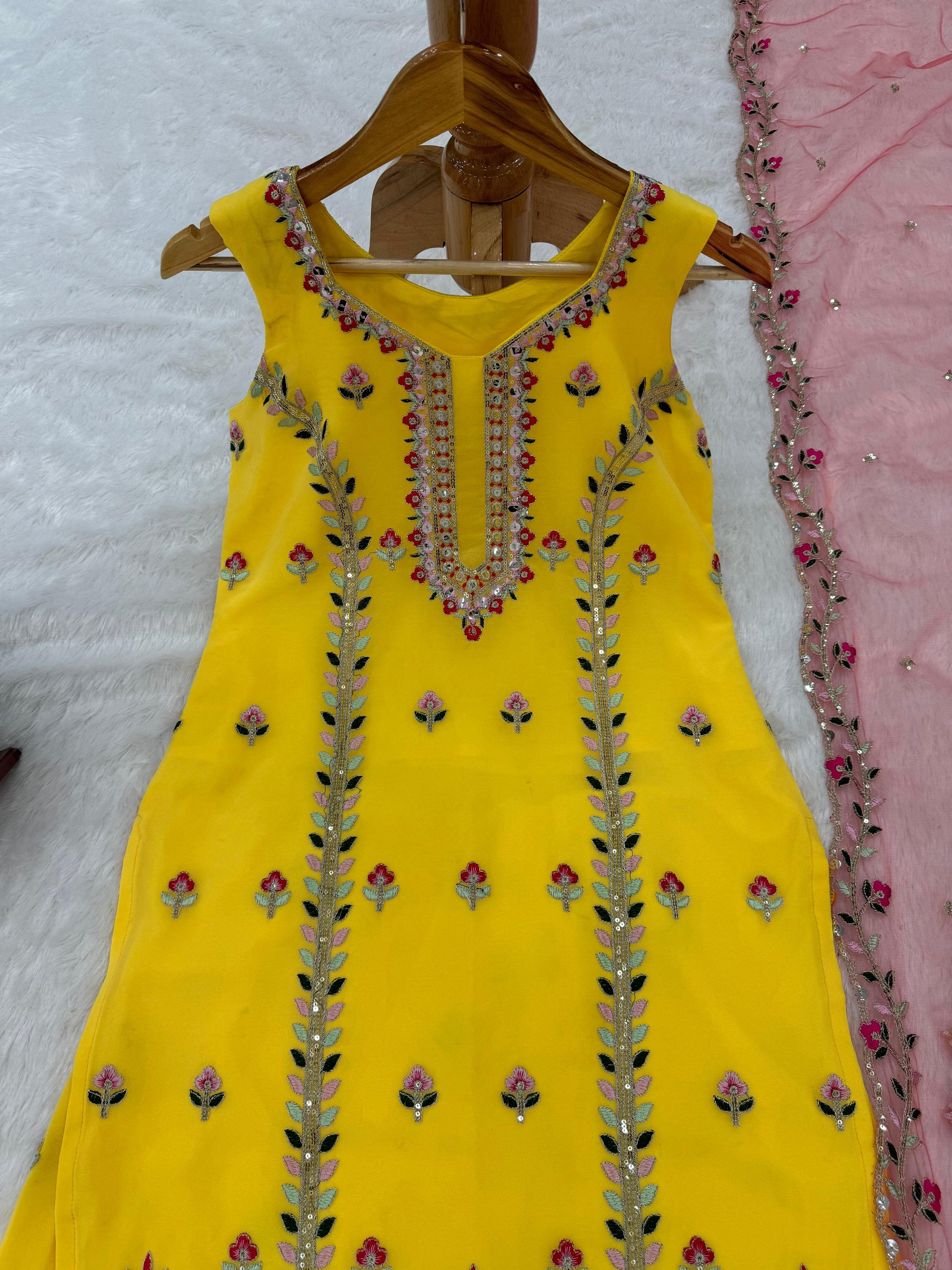 Yellow georgette embroidered sharara suit for haldi ceremony