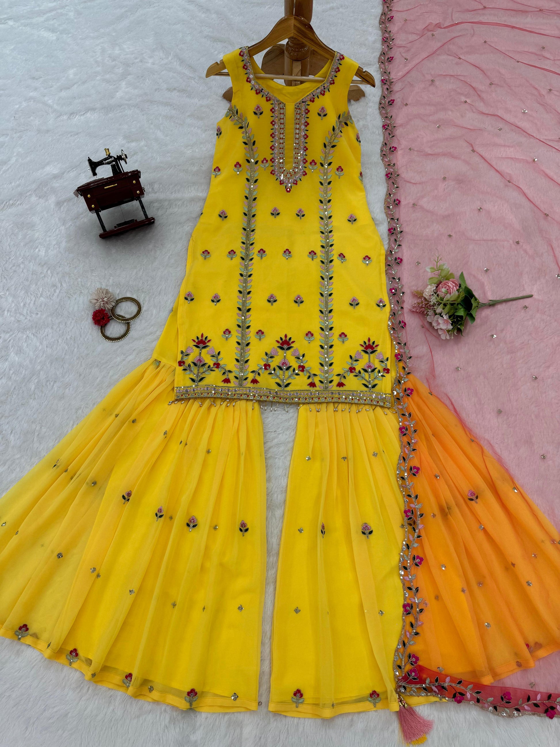 Yellow georgette embroidered sharara suit for haldi ceremony
