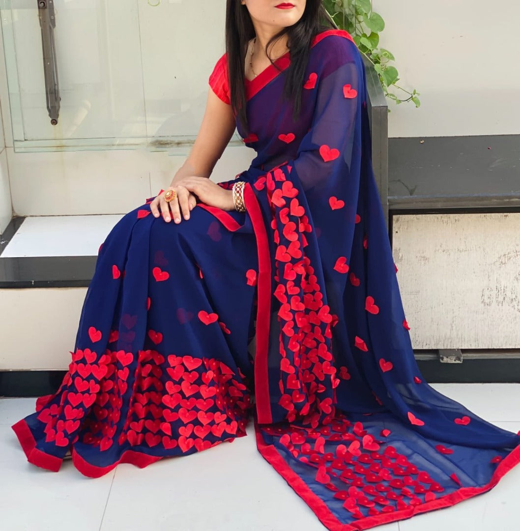 Baby pink georgette heart embellished saree