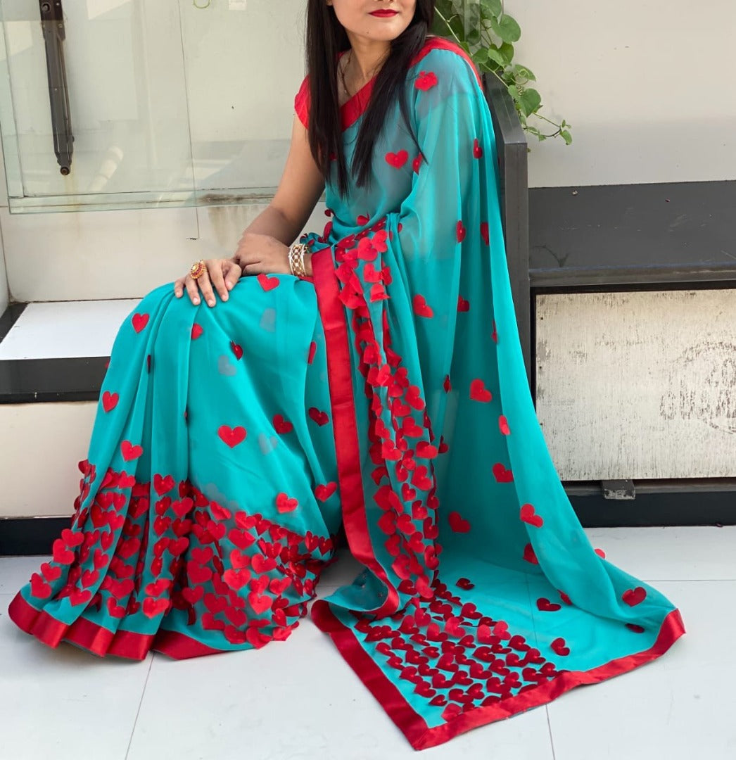 Baby pink georgette heart embellished saree