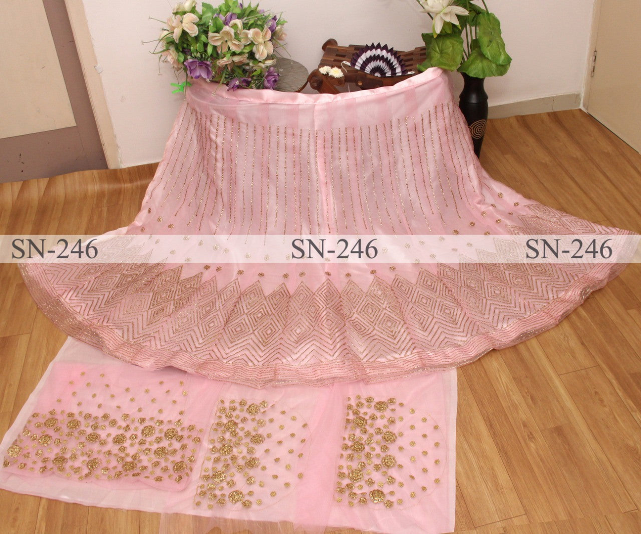 Baby pink mono net embroidered wedding lehenga choli