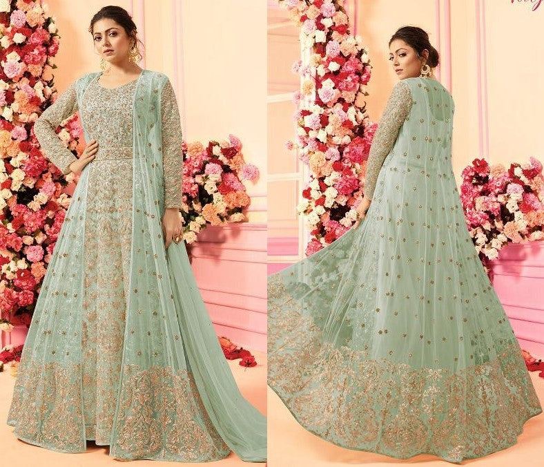 Baby pink net heavy embroidered wedding gown
