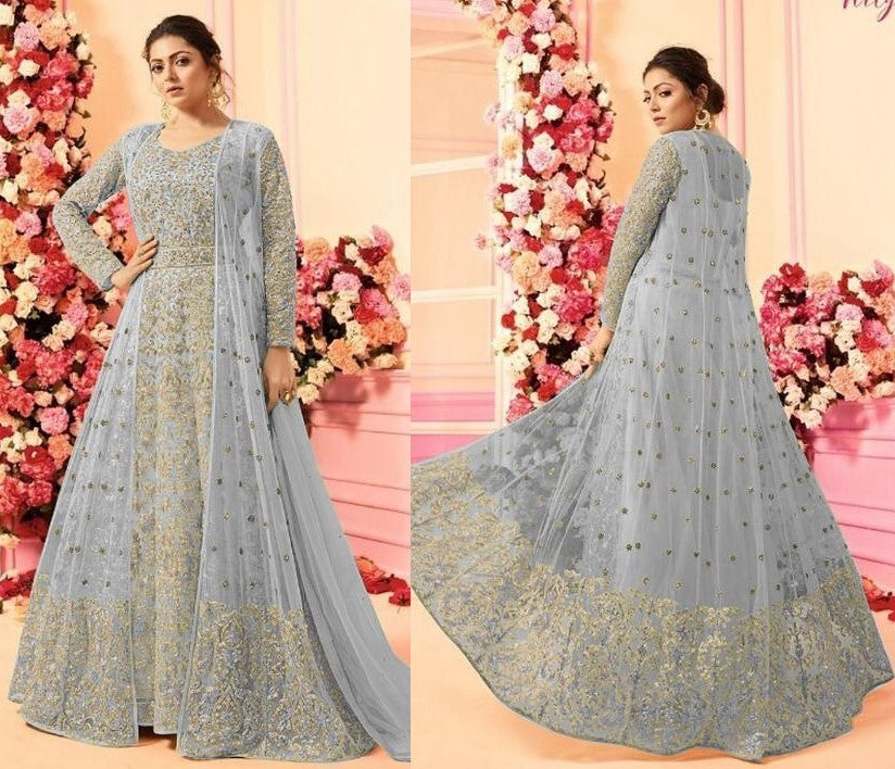 Baby pink net heavy embroidered wedding gown