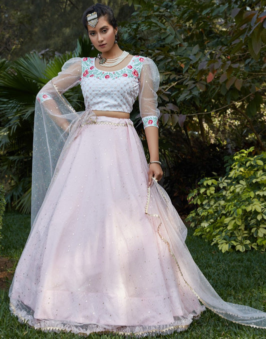 Baby pink net metallic foil printed thread embroidered lehenga choli