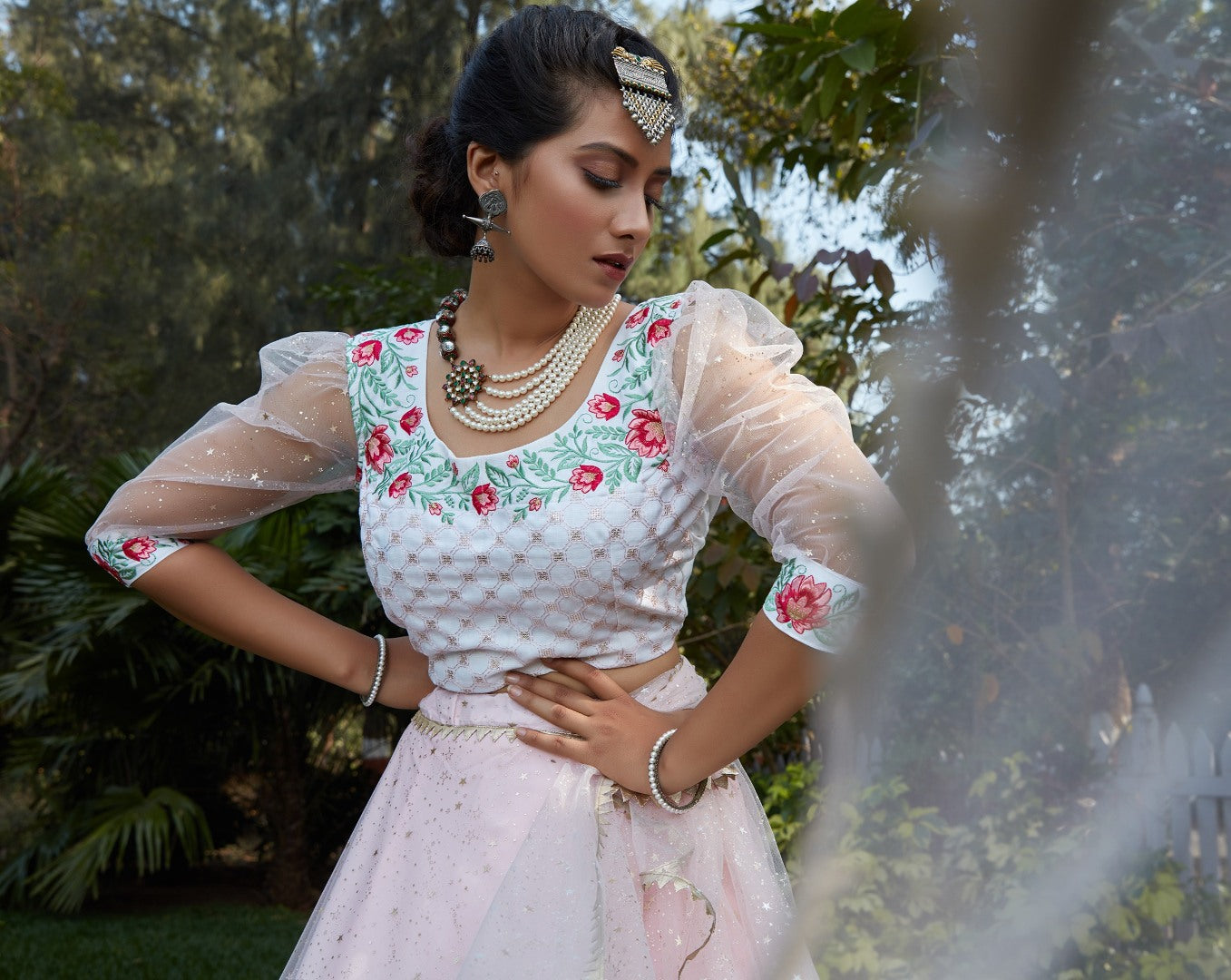 Baby pink net metallic foil printed thread embroidered lehenga choli
