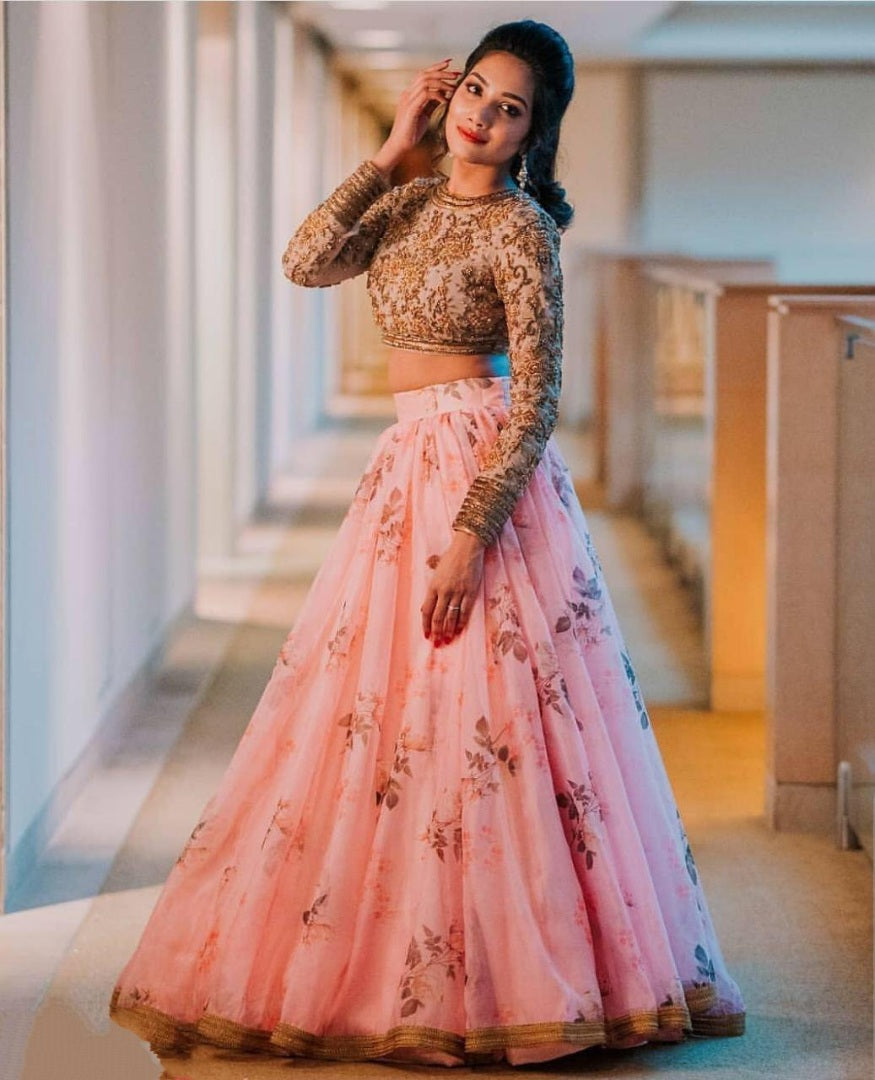 Baby pink organza printed lehenga with heavy work blouse