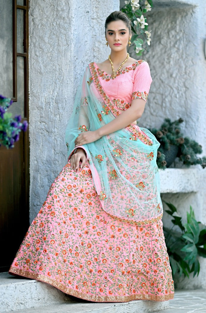 Baby pink silk heavy multi thread embroidery worked wedding lehenga