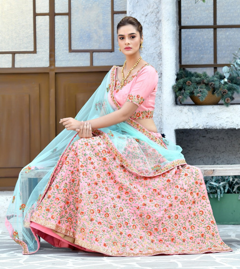 Baby pink silk heavy multi thread embroidery worked wedding lehenga