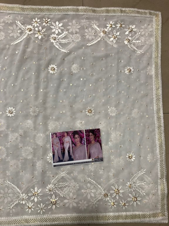 Beautiful bollywood style white ceremonial saree
