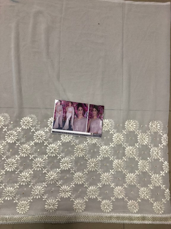 Beautiful bollywood style white ceremonial saree