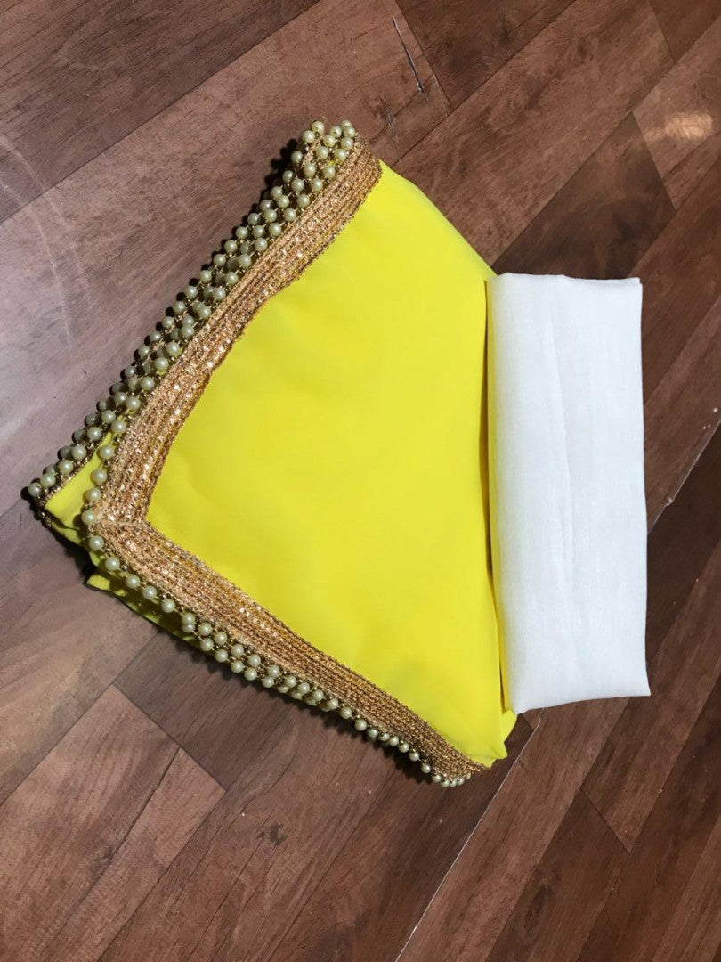 Beautiful divyanka yellow festival saree with moti lace