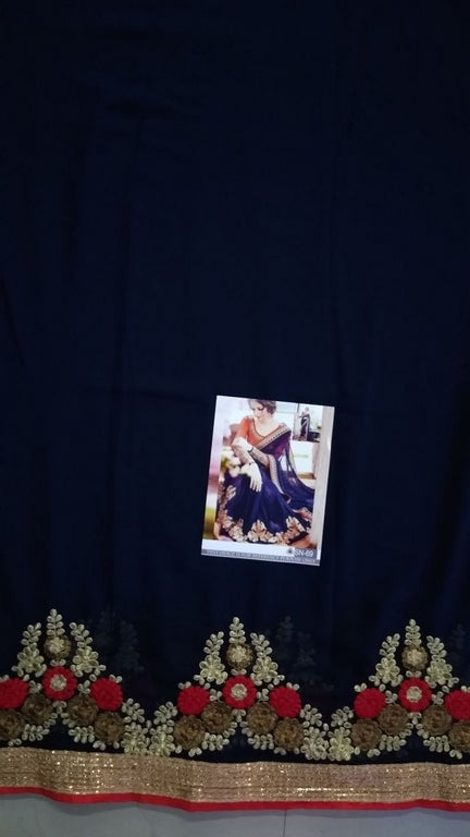 Beautiful embroidered blue wedding saree