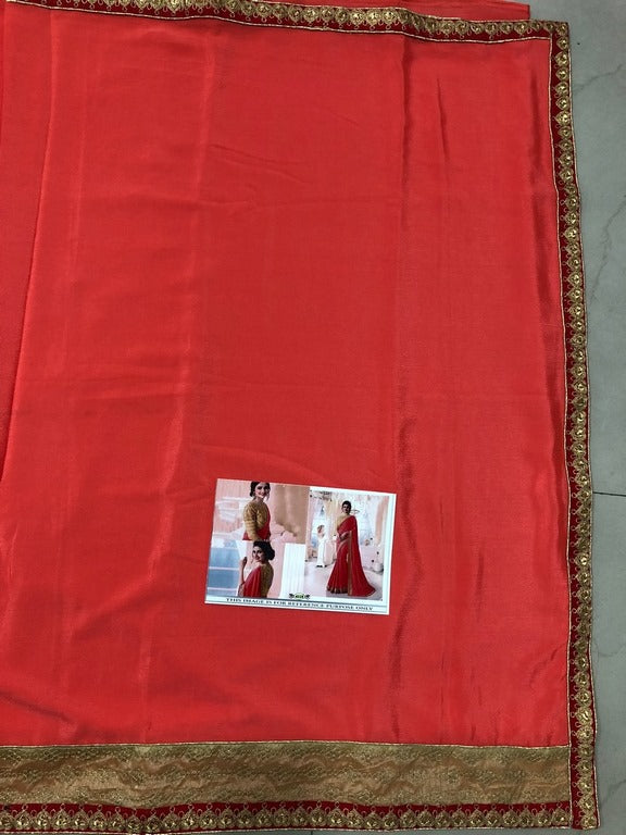 Beautiful neon orange embroidered partywear saree