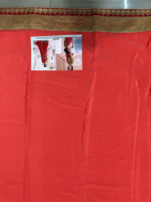 Beautiful neon orange embroidered partywear saree