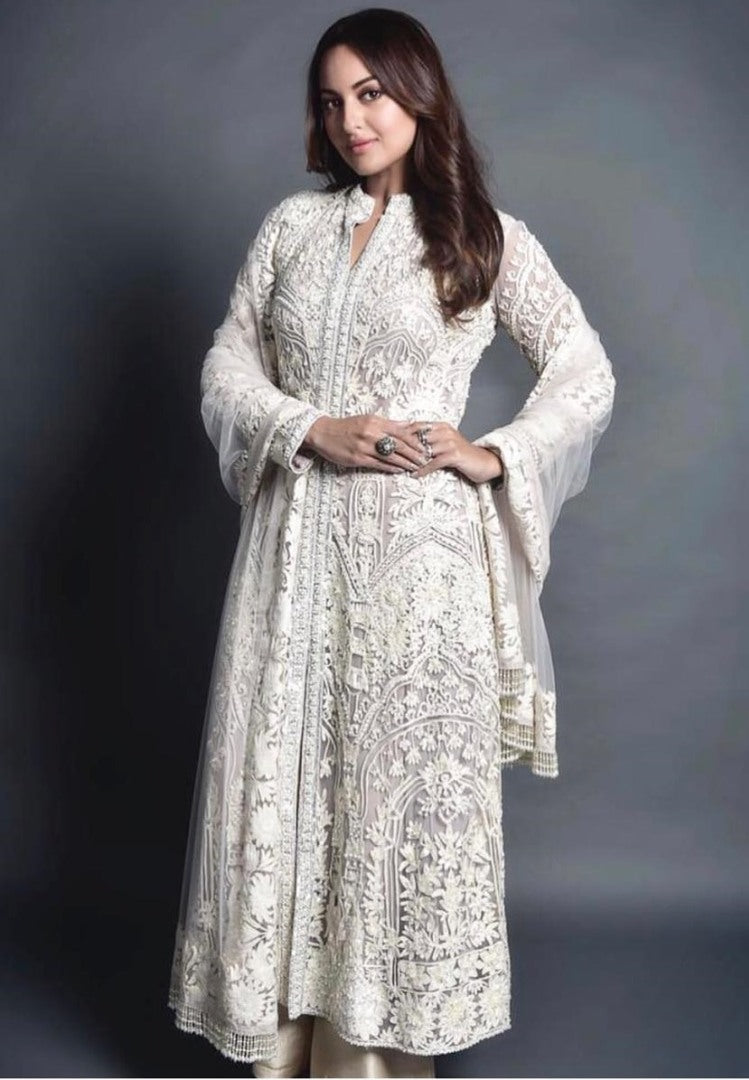 Beautiful white embroidered plazzo salwar suit