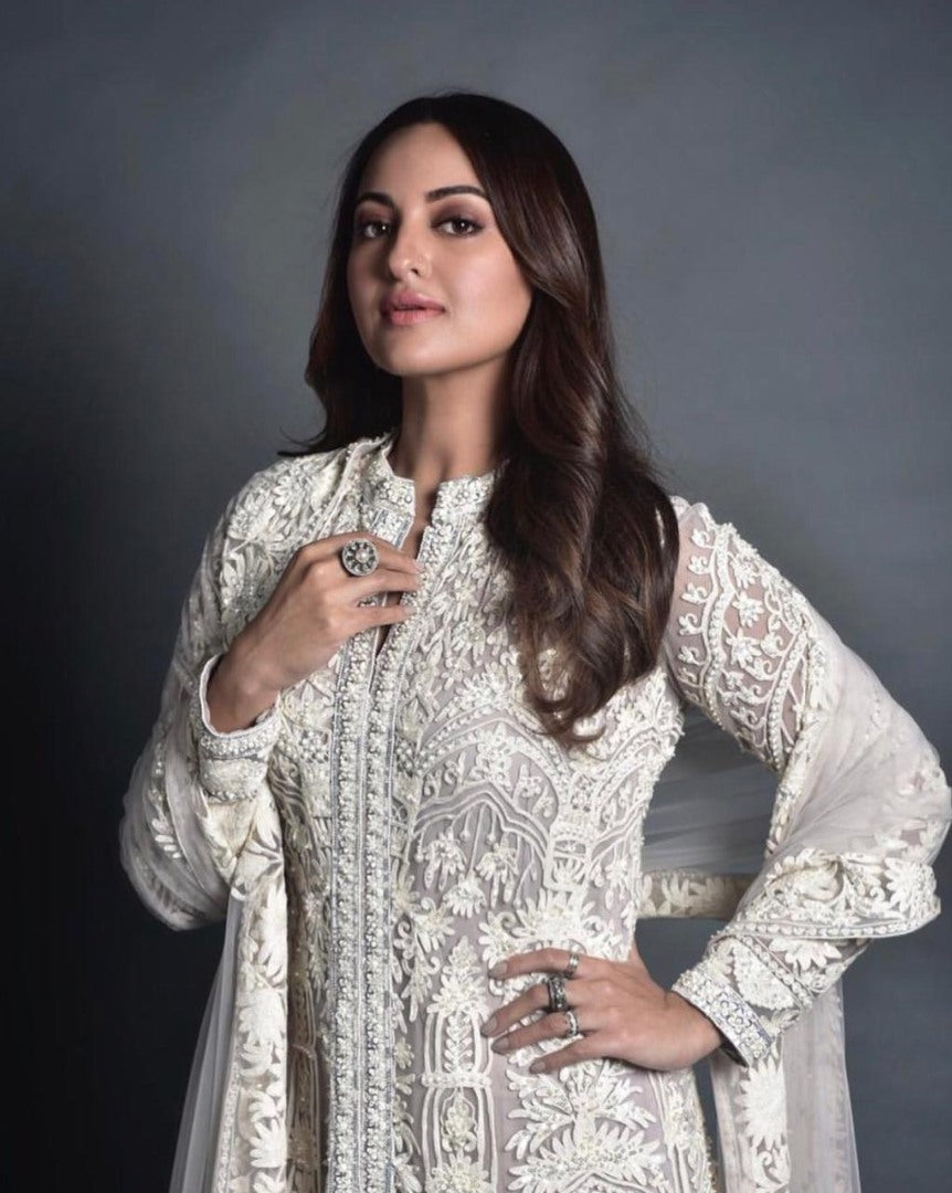 Beautiful white embroidered plazzo salwar suit