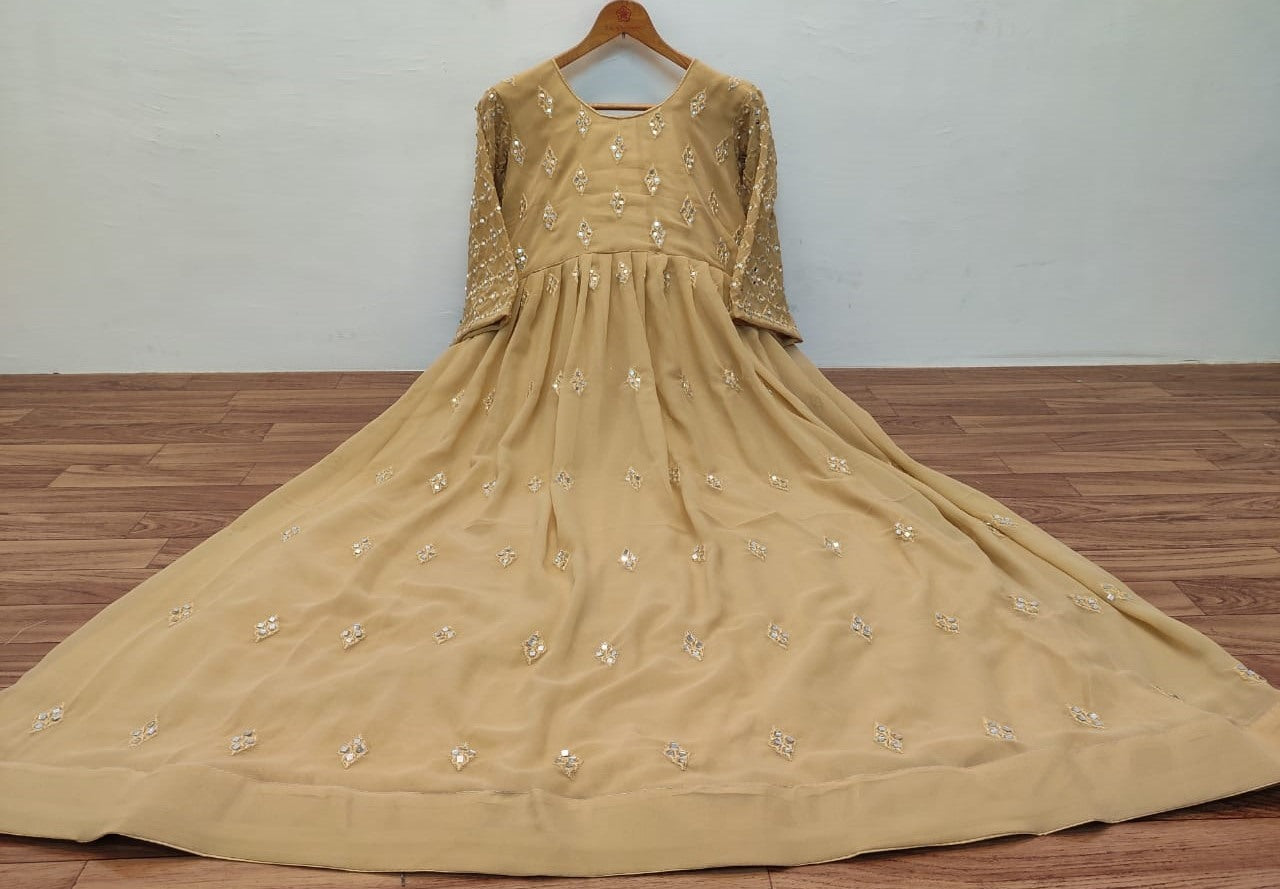 Beige georgette embroidered and mirror work gown