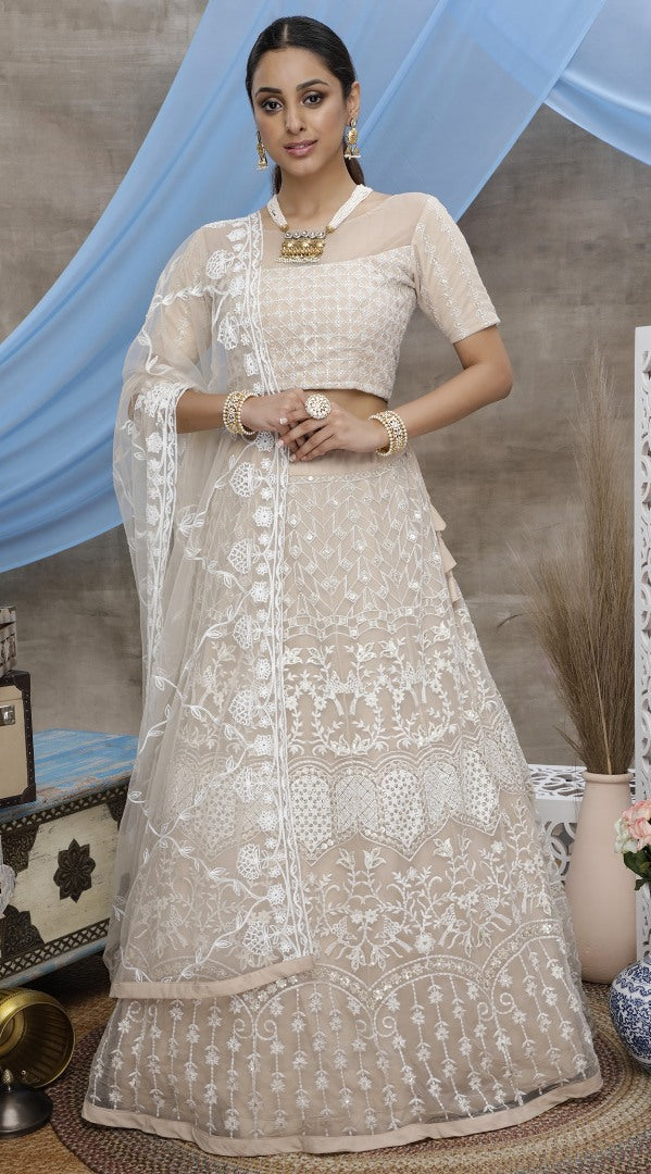 Beige net sequence embroidered party wear lehenga choli