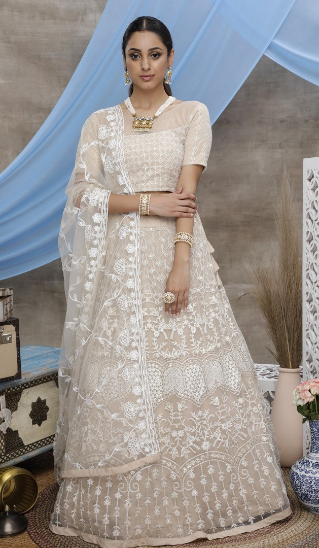 Beige net sequence embroidered party wear lehenga choli