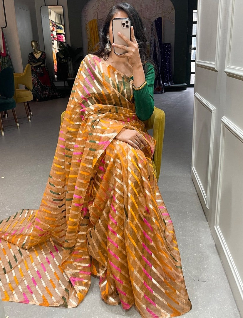 Beige organza zari weaving work organza saree