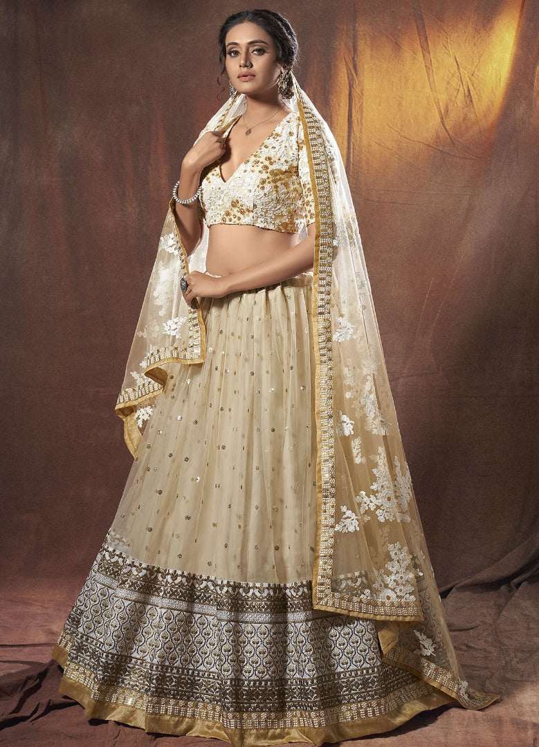 Beige soft net sequence zari work ceremonial lehenga choli