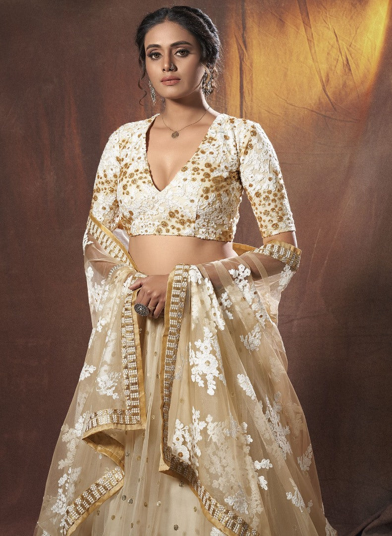 Beige soft net sequence zari work ceremonial lehenga choli