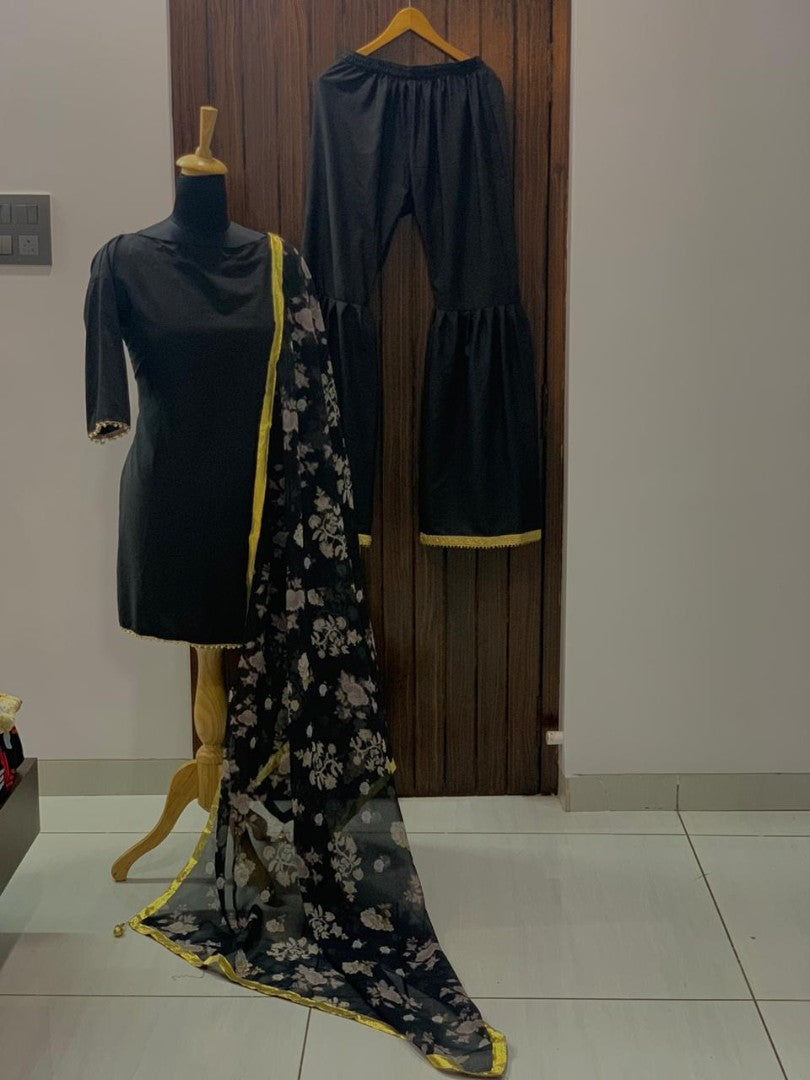Black crepe sharara suit with printed dupatta