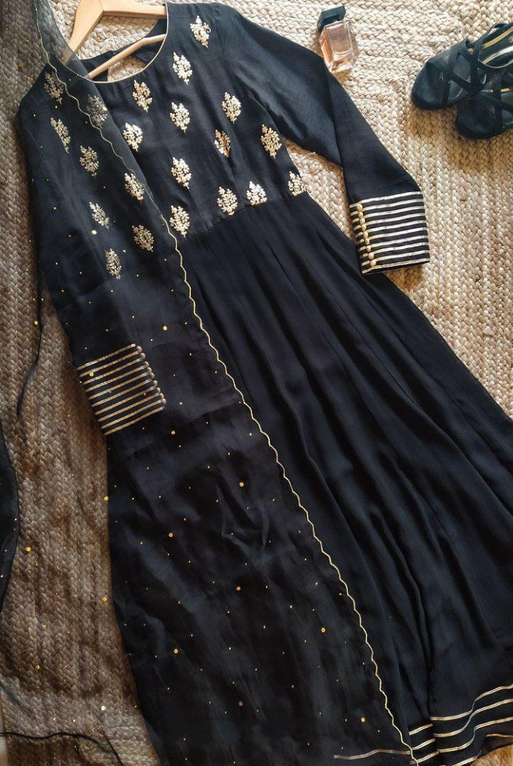 Black embroidery worked long anarkali suit