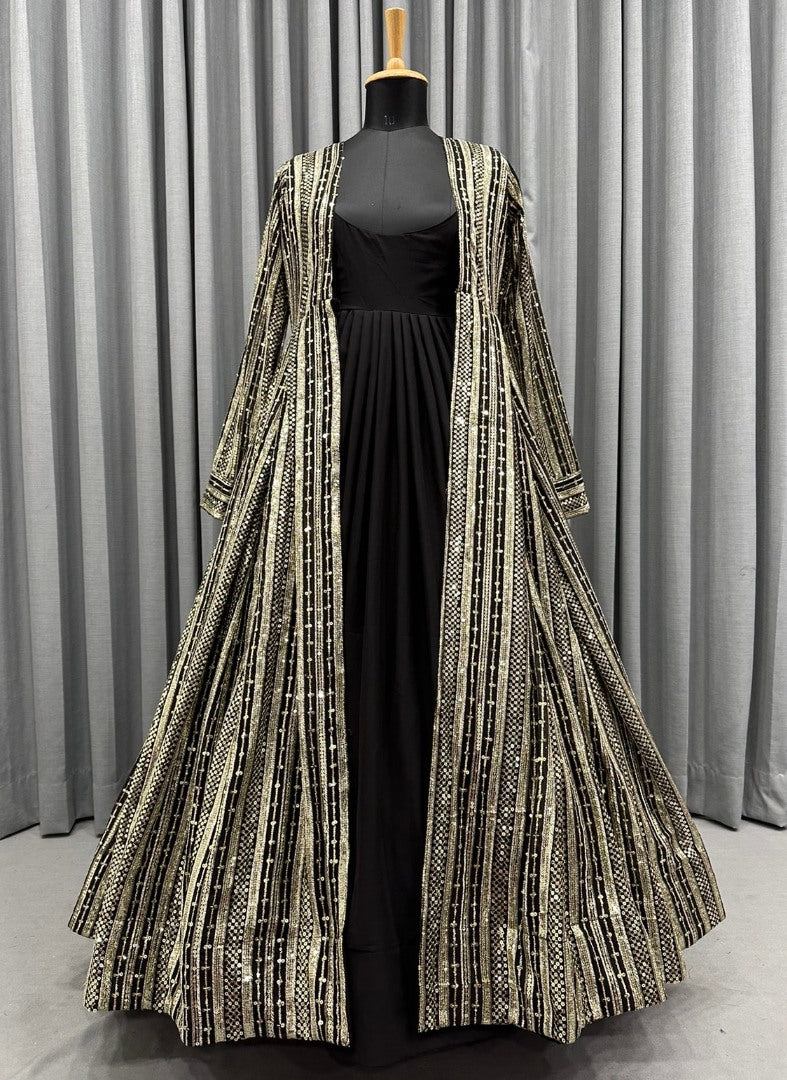 Black georgette gown with heavy embroidery work koti shrug