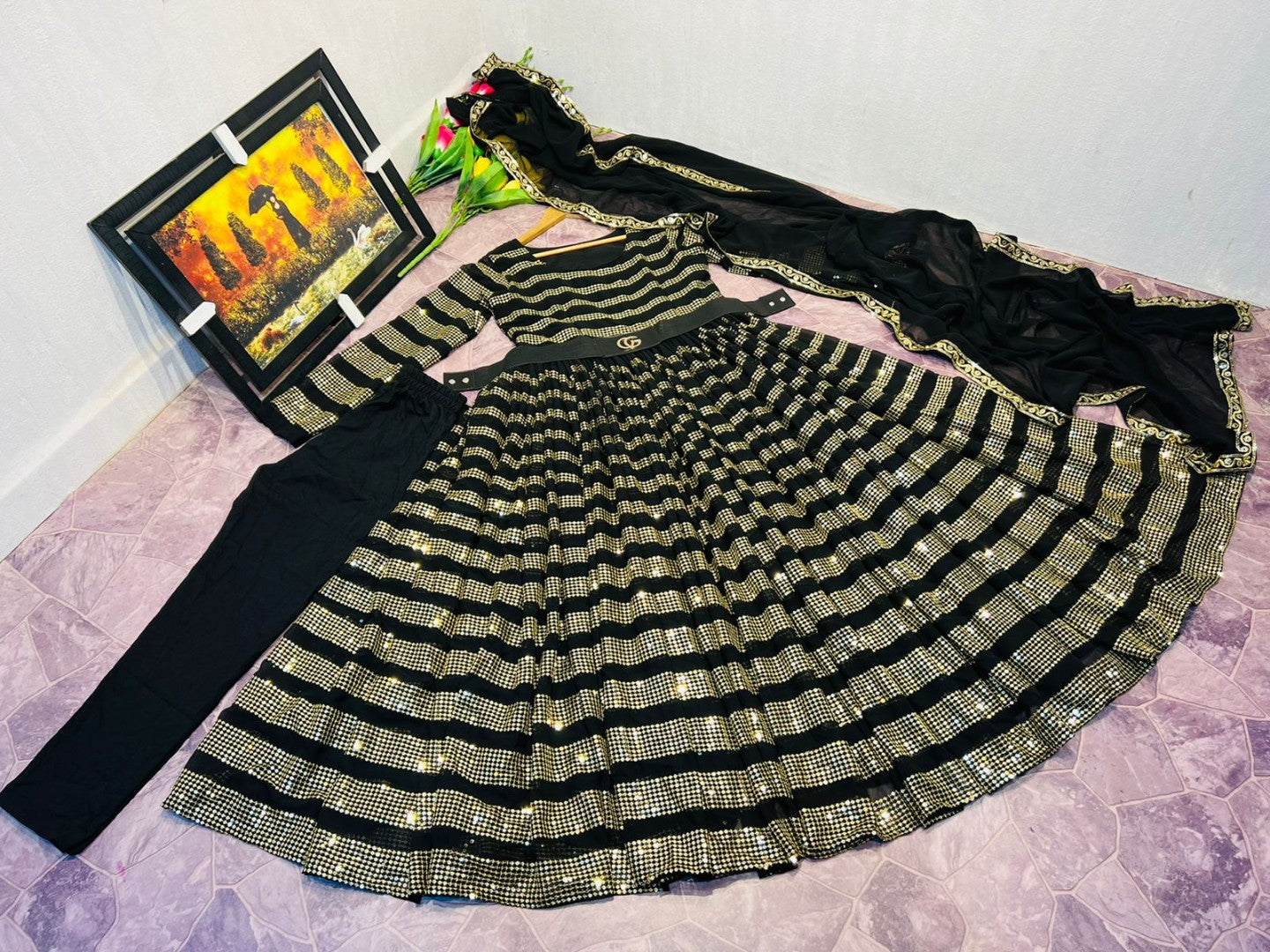 Black georgette heavy sequence work partywear gown with gucci belt