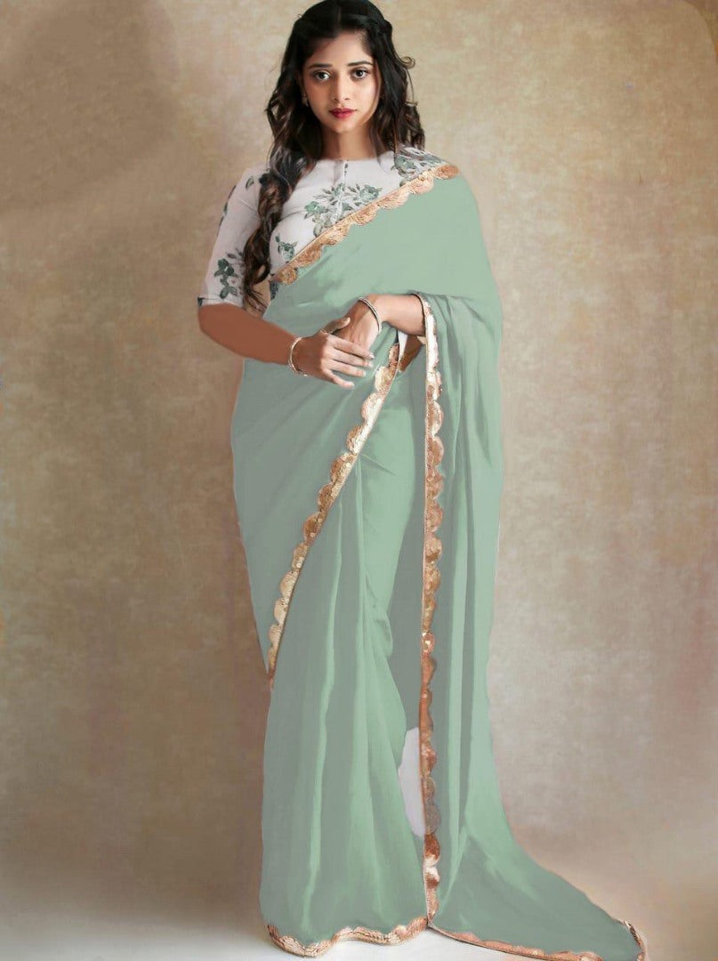 Black georgette partywear saree with sequence work gold border