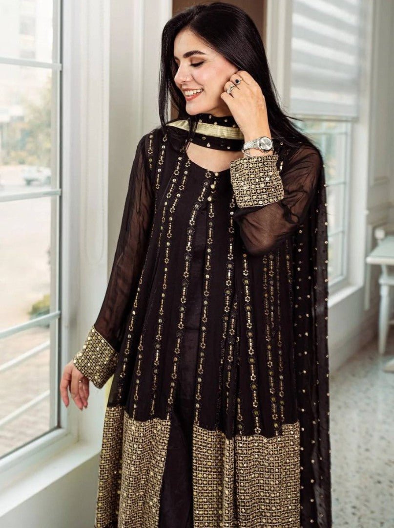 Black heavy embroidery worked salwar suit with shrug