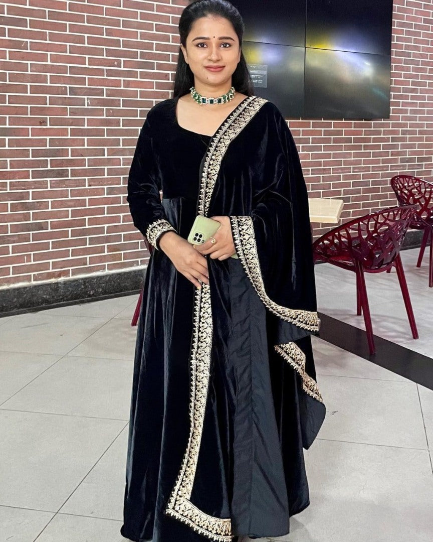 Black velvet embroidery worked long gown