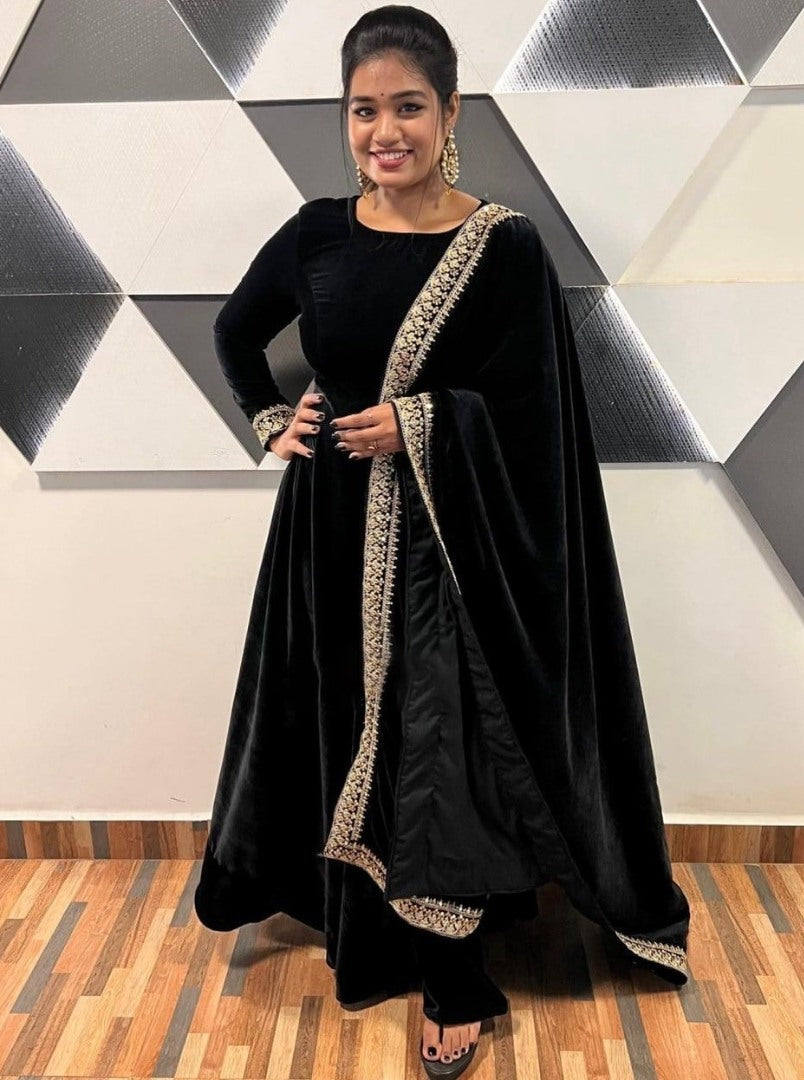 Black velvet embroidery worked long gown