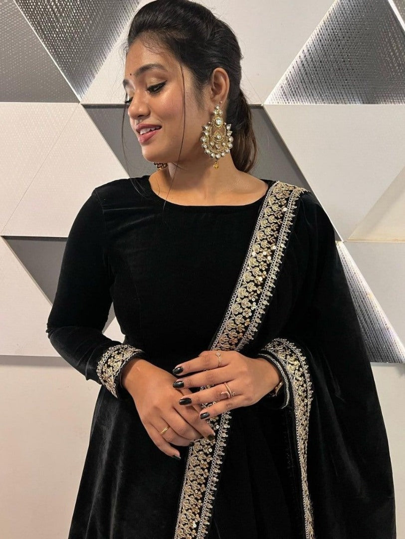 Black velvet embroidery worked long gown