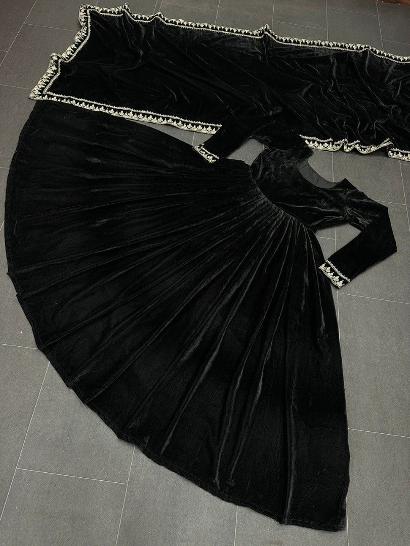 Black velvet embroidery worked long gown