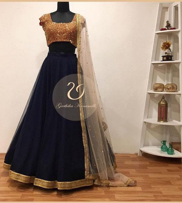 Blue net lehenga with sequence work blouse