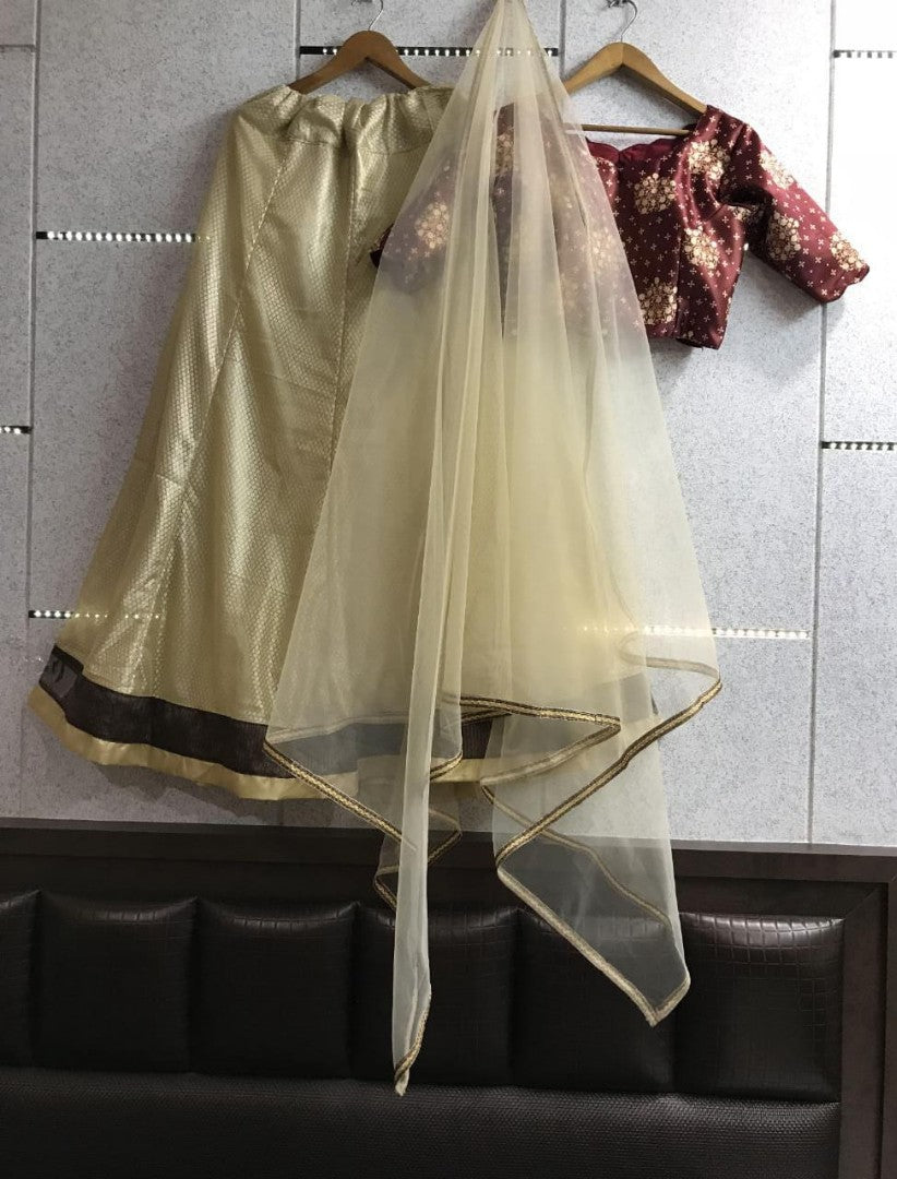 cream brasso net partywear lehenga with printed blouse