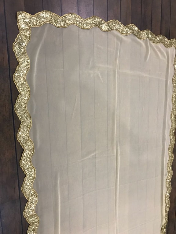 Cream georgette with sequence border partywear saree