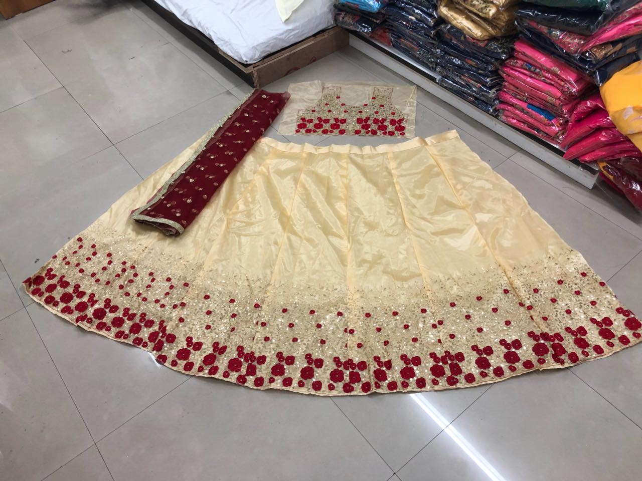 Cream net embroidered wedding lehenga