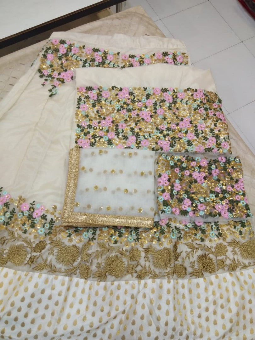 Cream net with cancan net embroidered wedding lehenga