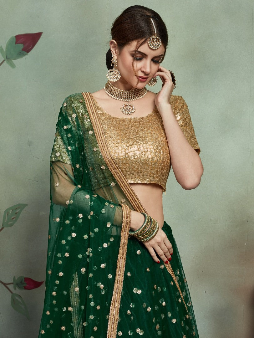 Dark green soft net sequence worked lehenga choli