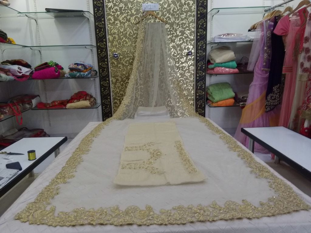 Designer cream embroidered stylist wedding saree