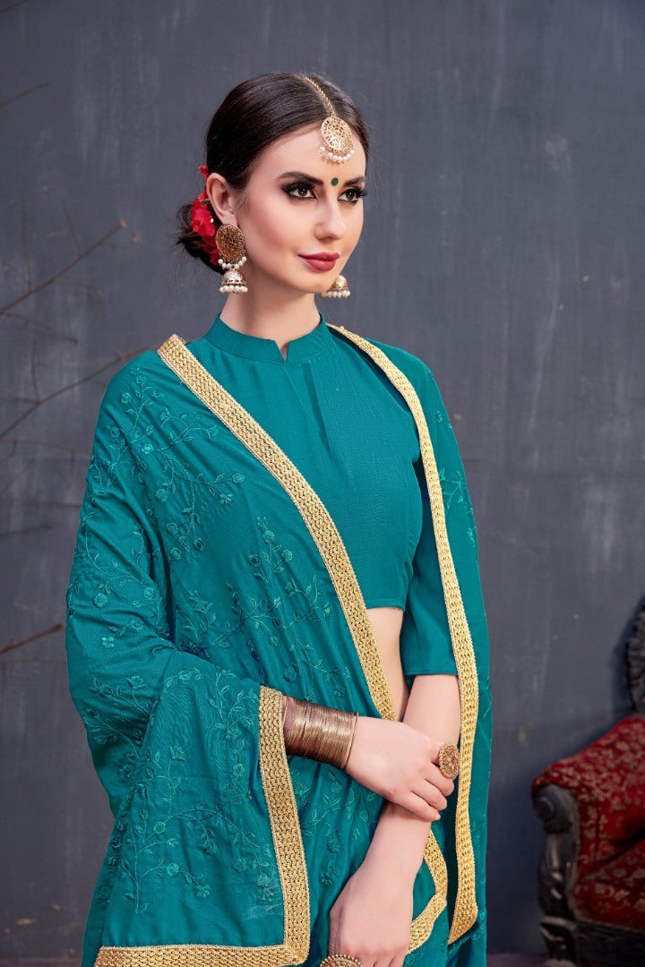 Designer teal blue embroidered partywear saree