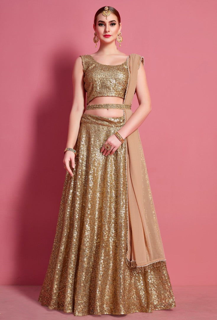 Gold soft net embroidered party wear lehenga choli
